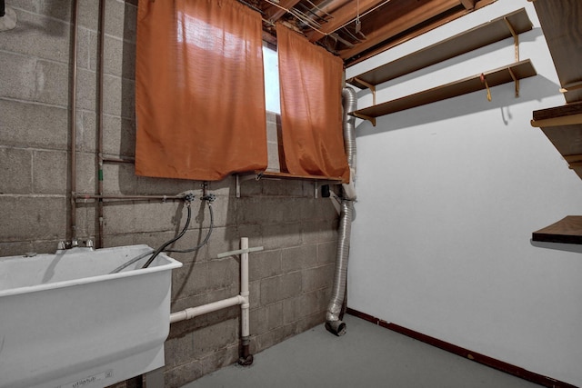 unfinished basement with a sink