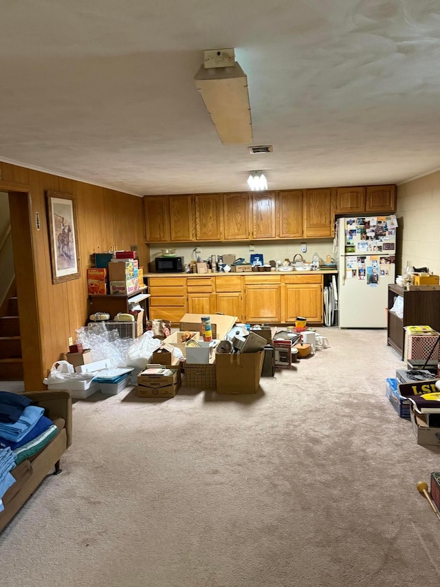 1721 W Union St, Lancaster, OH 43130 - miscellaneous room with stairs, wood walls, light colored carpet, and visible vents