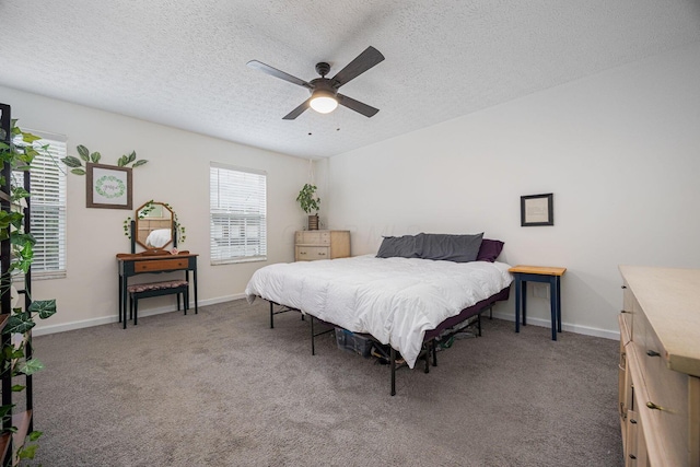 380 Oak Village Dr, Columbus, OH 43207 - bedroom with carpet floors, a textured ceiling, a ceiling fan, and baseboards
