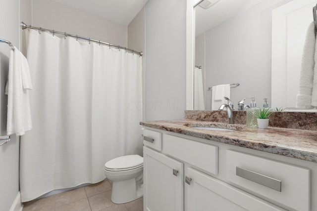 bathroom with toilet, a shower with curtain, tile patterned flooring, and vanity