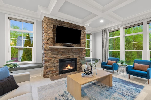 interior space with crown molding, a fireplace, coffered ceiling, and a wealth of natural light