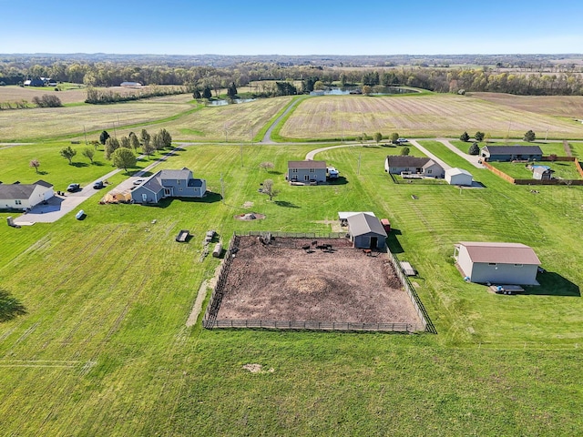 birds eye view of property featuring a rural view