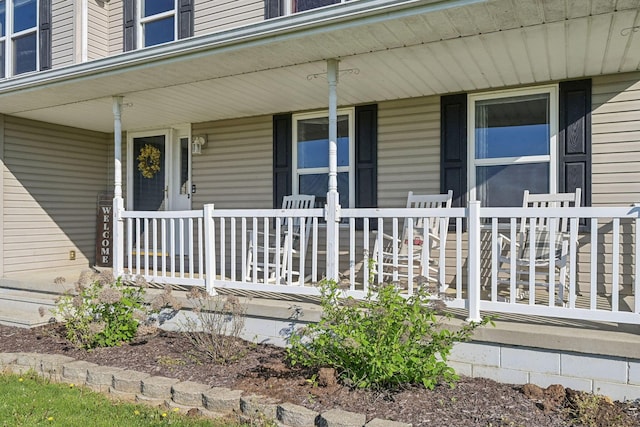 doorway to property featuring a porch