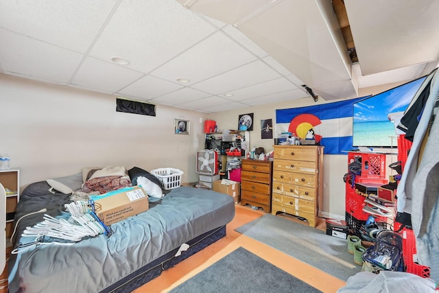 bedroom with a drop ceiling