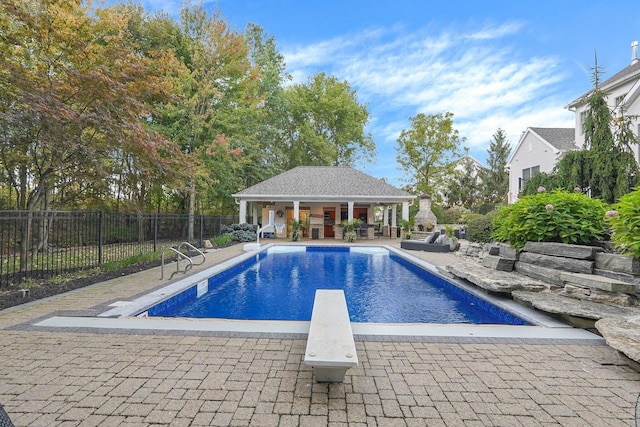 2443 Shepherd Ct, Powell, OH 43065 - view of pool with a diving board, a patio area, fence, and an outdoor structure