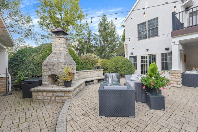 2443 Shepherd Ct, Powell, OH 43065 - view of patio featuring a balcony and an outdoor living space with a fireplace