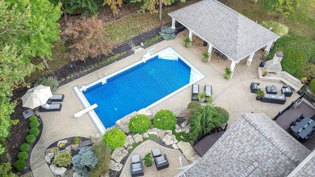 2443 Shepherd Ct, Powell, OH 43065 - view of swimming pool featuring a diving board and a patio