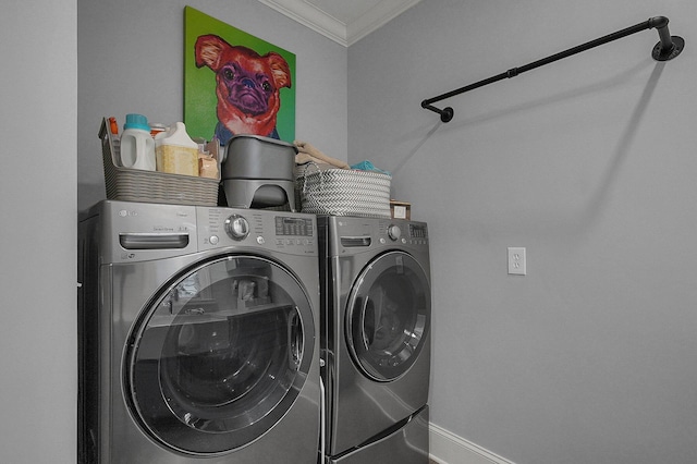 2443 Shepherd Ct, Powell, OH 43065 - washroom featuring crown molding, separate washer and dryer, and baseboards