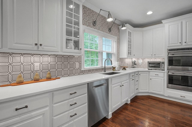 2443 Shepherd Ct, Powell, OH 43065 - kitchen with appliances with stainless steel finishes, white cabinetry, a sink, light countertops, and recessed lighting