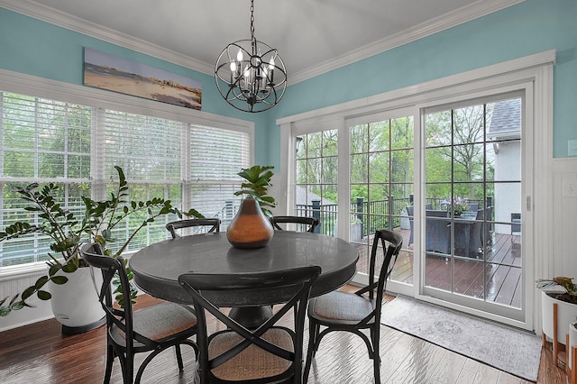 2443 Shepherd Ct, Powell, OH 43065 - dining area featuring a chandelier, crown molding, and hardwood / wood-style flooring
