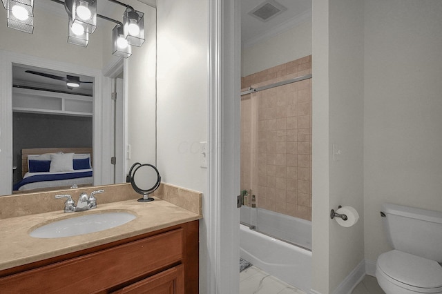 2443 Shepherd Ct, Powell, OH 43065 - full bath featuring toilet, vanity, bath / shower combo with glass door, marble look tile flooring, and ornamental molding