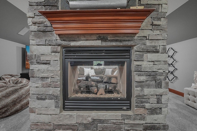 2443 Shepherd Ct, Powell, OH 43065 - detailed view of a stone fireplace and carpet