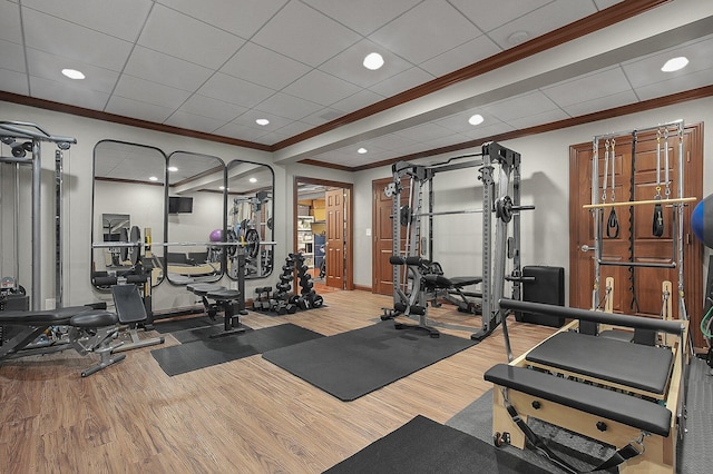 2443 Shepherd Ct, Powell, OH 43065 - exercise room featuring crown molding, wood finished floors, recessed lighting, and baseboards