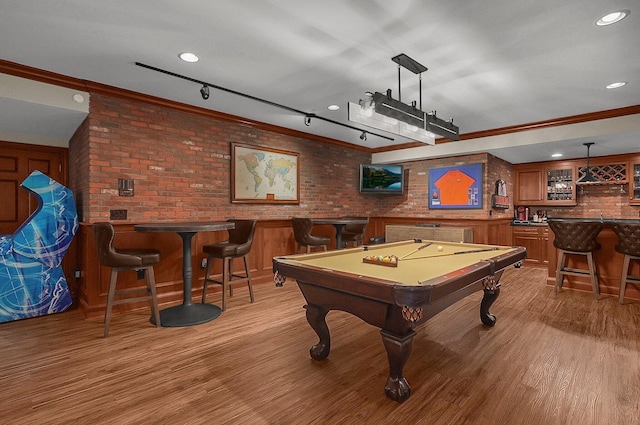 2443 Shepherd Ct, Powell, OH 43065 - game room featuring wet bar, crown molding, light wood-style flooring, brick wall, and billiards table