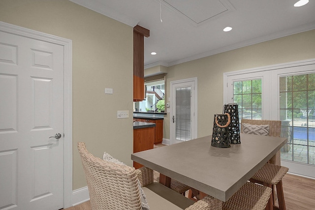 2443 Shepherd Ct, Powell, OH 43065 - dining area with light wood-style flooring, baseboards, recessed lighting, and crown molding