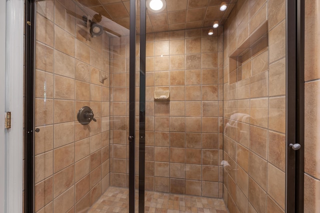 full bathroom with recessed lighting and a stall shower