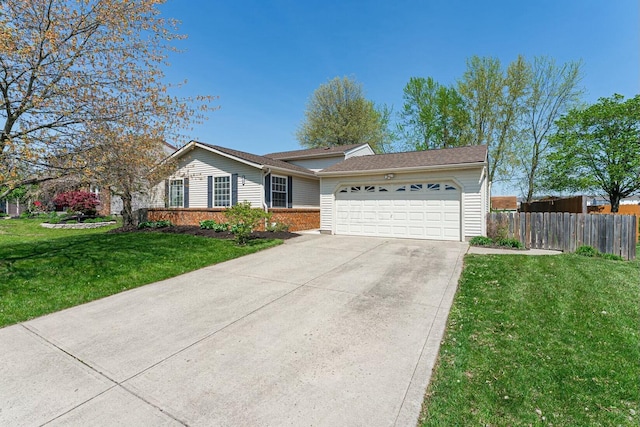 ranch-style home featuring a garage, fence, a front lawn, and driveway