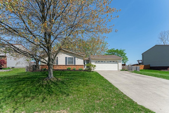 ranch-style home with fence, a front yard, concrete driveway, and an attached garage