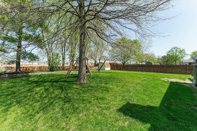 view of yard with a fenced backyard