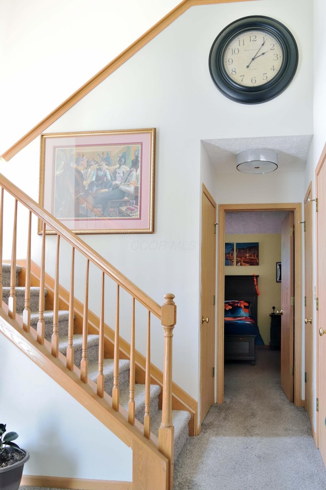 2651 Winningwillow Dr, Columbus, OH 43207 - corridor with carpet floors and stairway