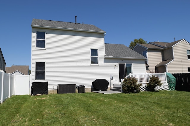 2651 Winningwillow Dr, Columbus, OH 43207 - back of house with a deck, central AC unit, and a shingled roof
