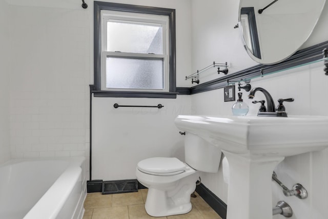 full bathroom with tile patterned flooring, baseboards, shower / bathtub combination, and toilet