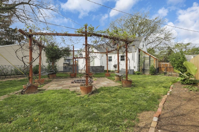 view of yard with a patio and a fenced backyard