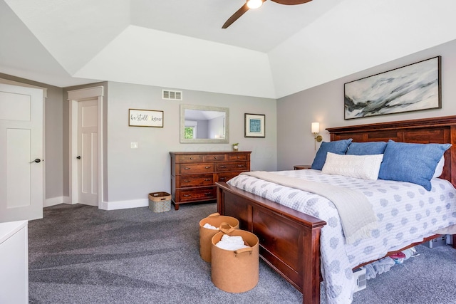 bedroom with visible vents, baseboards, dark colored carpet, a ceiling fan, and vaulted ceiling