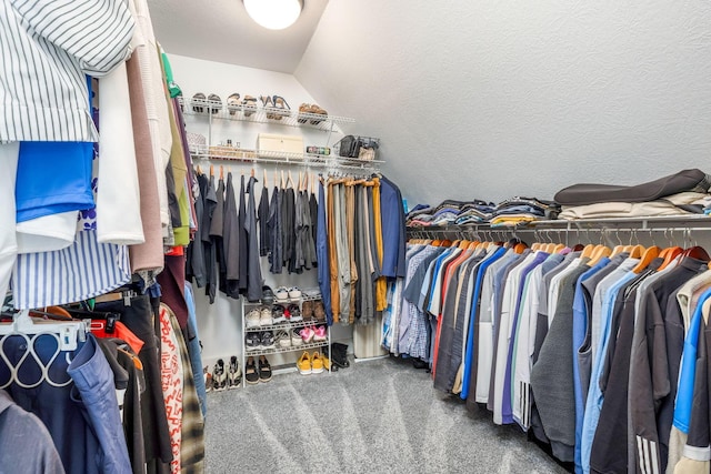 spacious closet with carpet flooring