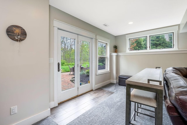 office space with visible vents, recessed lighting, baseboards, and wood finished floors