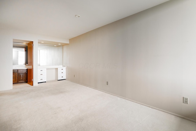 1000 Urlin Ave Unit 1407, Columbus, OH 43212 - unfurnished bedroom featuring baseboards, recessed lighting, and light colored carpet
