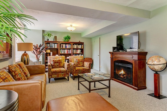 1000 Urlin Ave Unit 1407, Columbus, OH 43212 - carpeted living room with a glass covered fireplace and baseboards