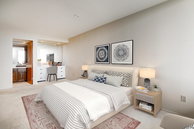 1000 Urlin Ave Unit 1407, Columbus, OH 43212 - bedroom featuring light colored carpet, recessed lighting, and connected bathroom