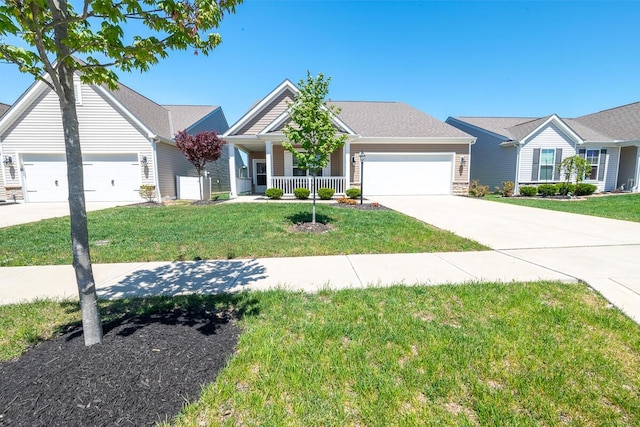 ranch-style house with a porch, driveway, a front yard, and a garage