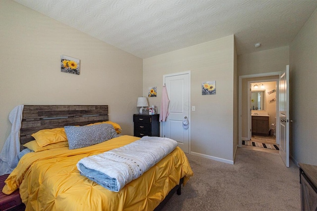 bedroom with baseboards, carpet, and lofted ceiling