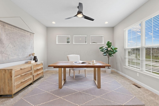 carpeted home office featuring recessed lighting, ceiling fan, visible vents, and baseboards