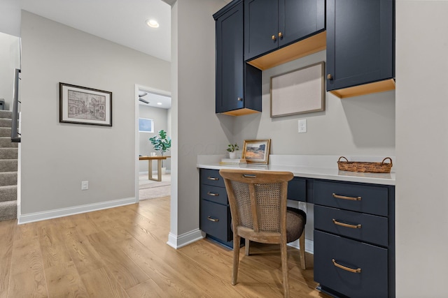 office with light wood-type flooring, recessed lighting, and baseboards