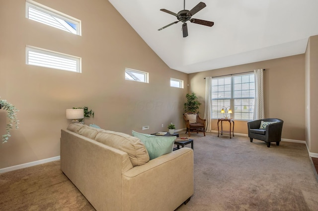 living room with baseboards, carpet, plenty of natural light, and high vaulted ceiling