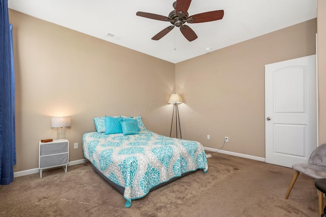 bedroom with carpet flooring, baseboards, and visible vents