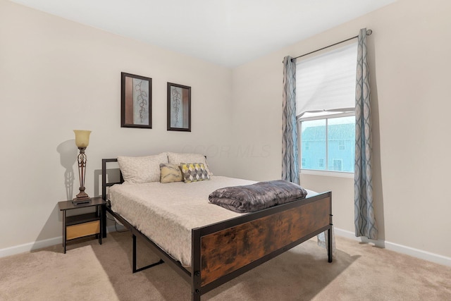 8573 Greengate Blvd Unit 41, Canal Winchester, OH 43110 - bedroom featuring baseboards and light colored carpet
