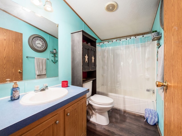 full bathroom with shower / tub combo with curtain, vanity, toilet, wood finished floors, and lofted ceiling