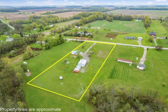 birds eye view of property featuring a rural view