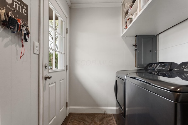 laundry area with washing machine and clothes dryer, laundry area, plenty of natural light, and electric panel