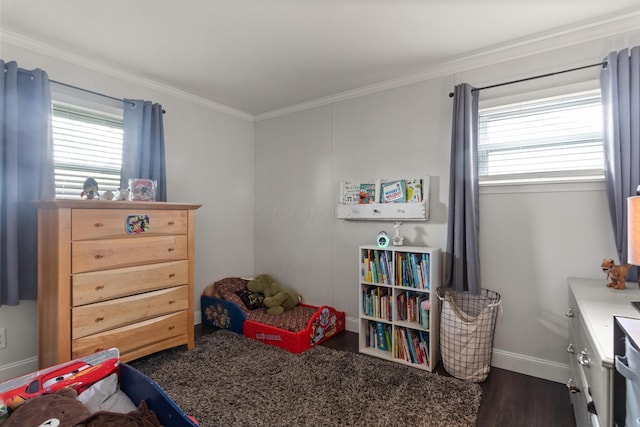bedroom with baseboards, multiple windows, ornamental molding, and dark wood finished floors