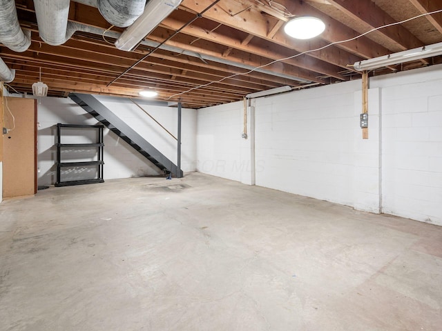 unfinished basement with stairway