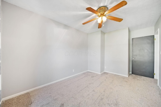 4959 Hughes Rd, Prospect, OH 43342 - carpeted empty room featuring baseboards and a ceiling fan
