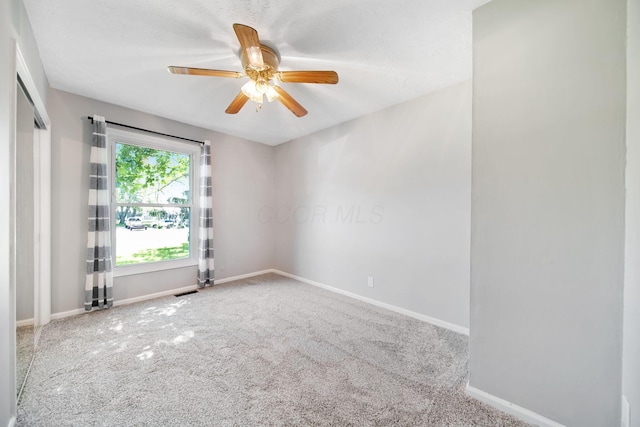 4959 Hughes Rd, Prospect, OH 43342 - carpeted empty room with baseboards and a ceiling fan