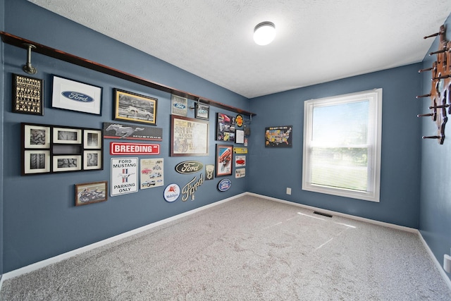 4959 Hughes Rd, Prospect, OH 43342 - carpeted spare room featuring a textured ceiling and baseboards