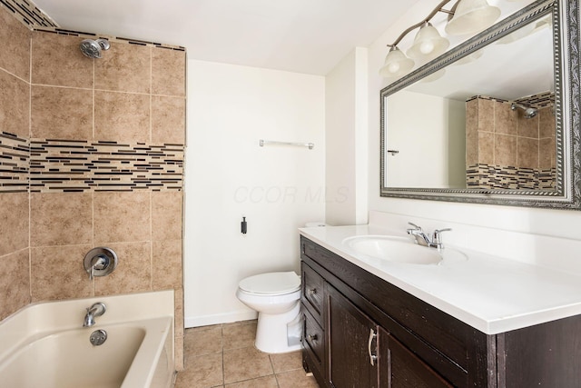full bath featuring toilet, vanity, tile patterned floors, and baseboards