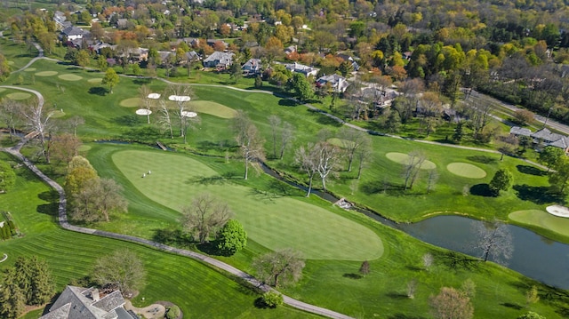 drone / aerial view featuring a water view and a residential view